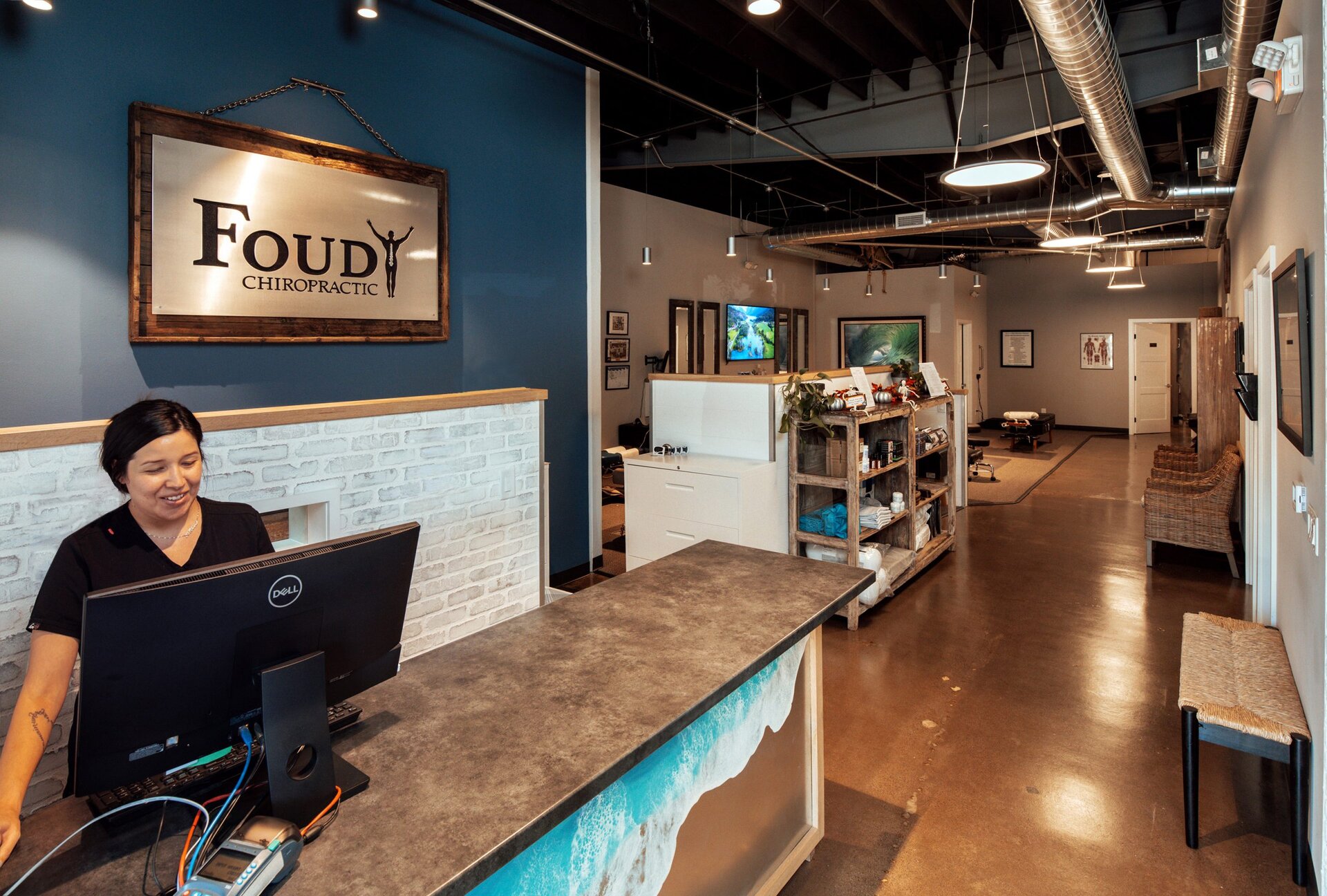 Reception and open treatment floor at Foudy Chiropractic, Mission Viejo