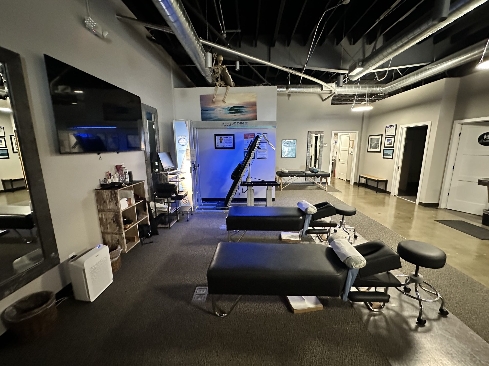 The open treatment floor and AccuSpina area at Foudy Chiropractic in Mission Viejo