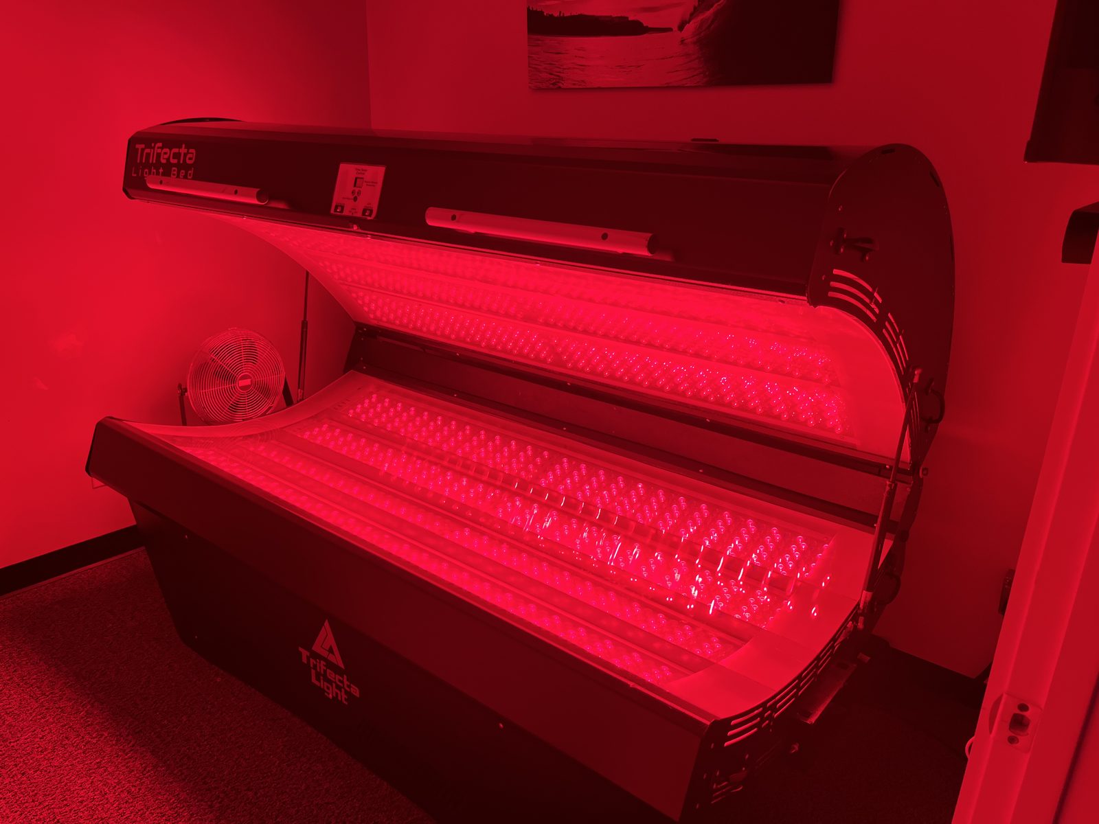 The Trifecta Light red light therapy bed at Foudy Chiropractic in Mission Viejo